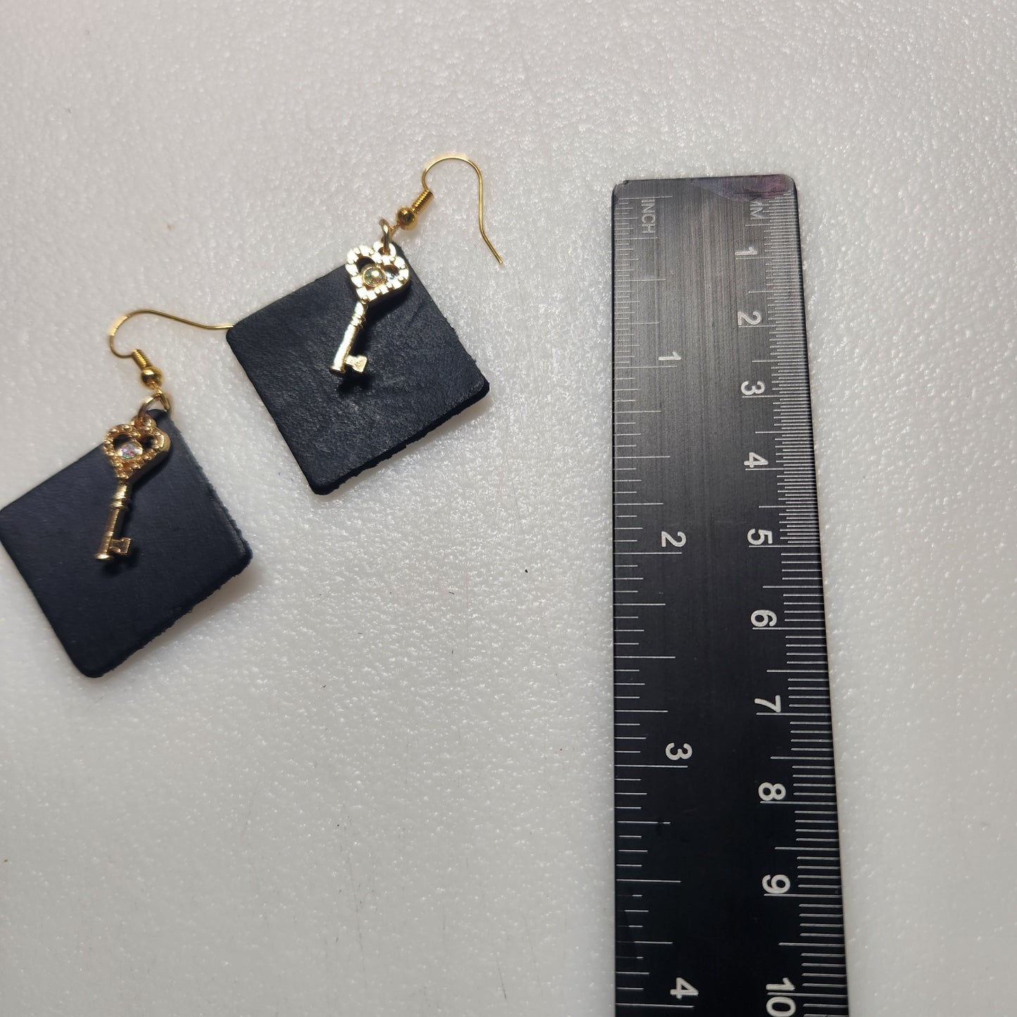 Fun Black Leather Earrings with Gold-toned Key Charm