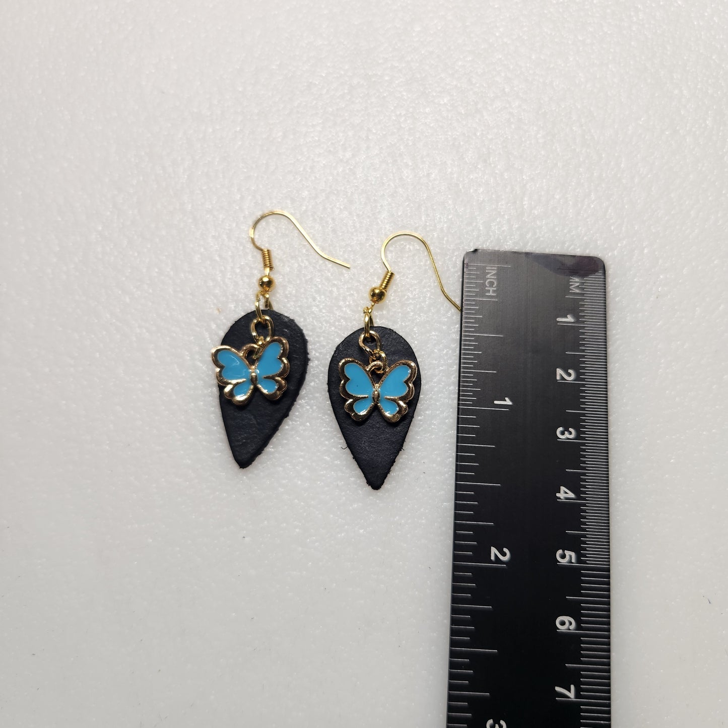 Dark Blue Leather Earrings with Bright Happy Butterfly Charm