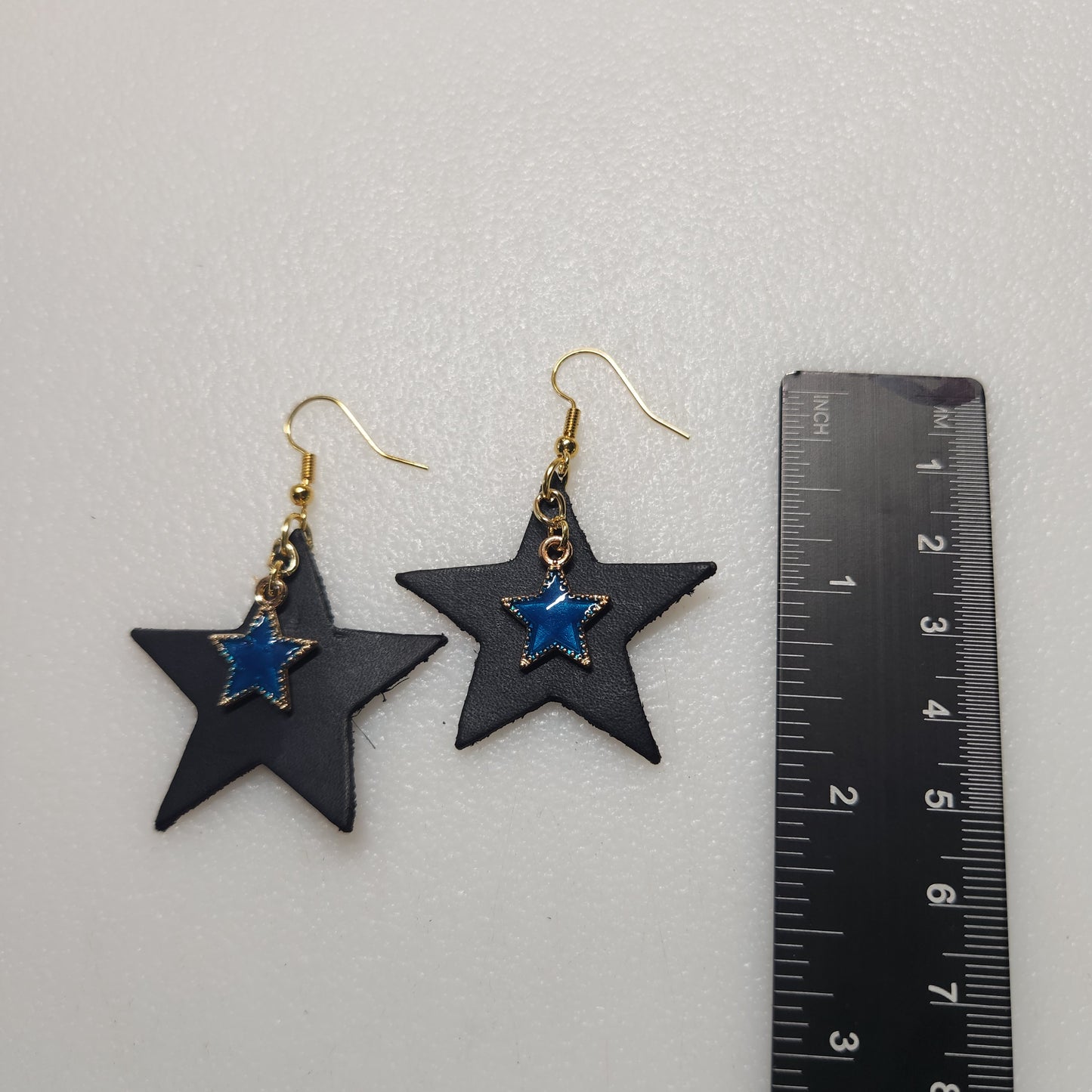 Striking Blue Leather Earrings with Bright Turquoise Charm