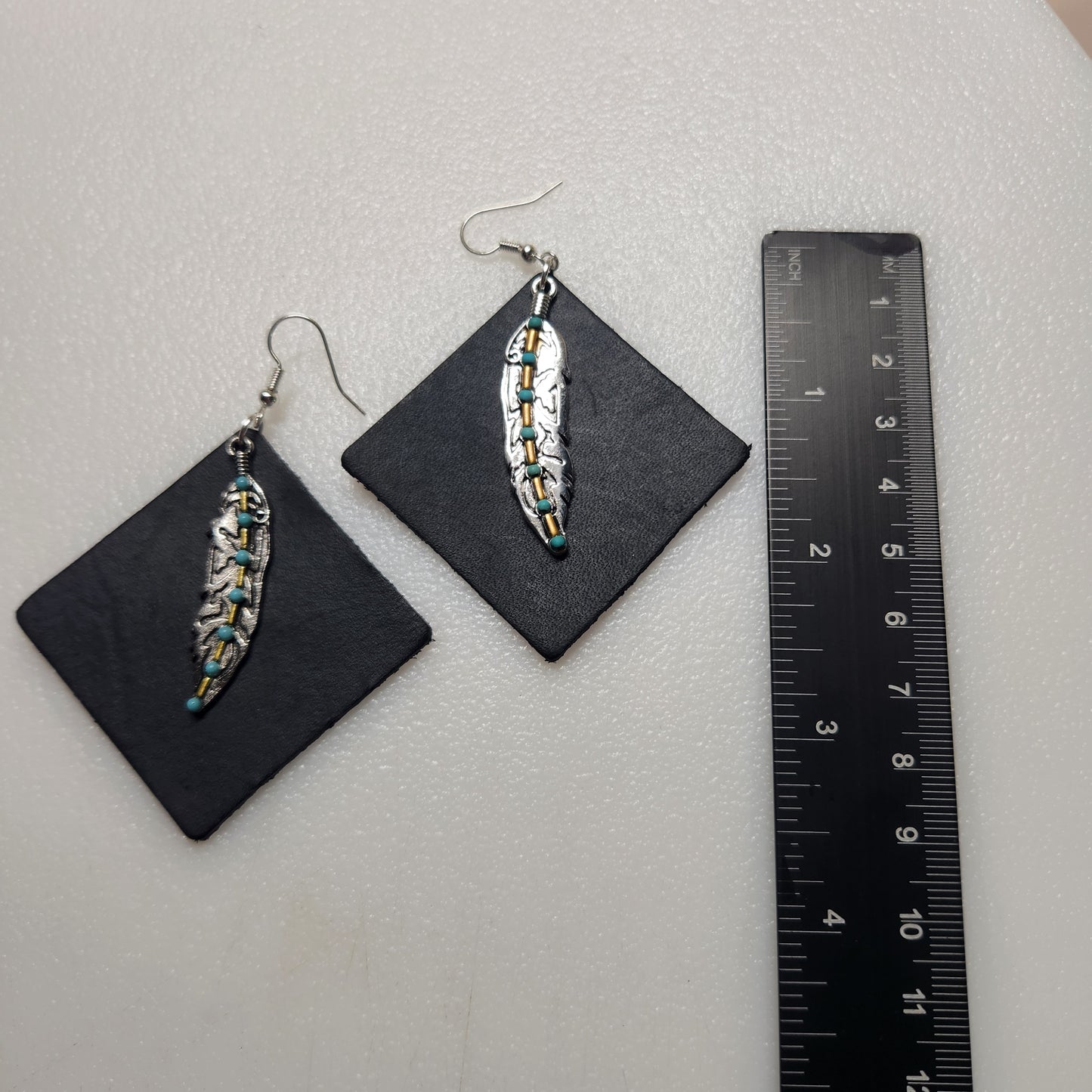Big, Bold and Beautiful! Black Leather Earrings with Feather Charm