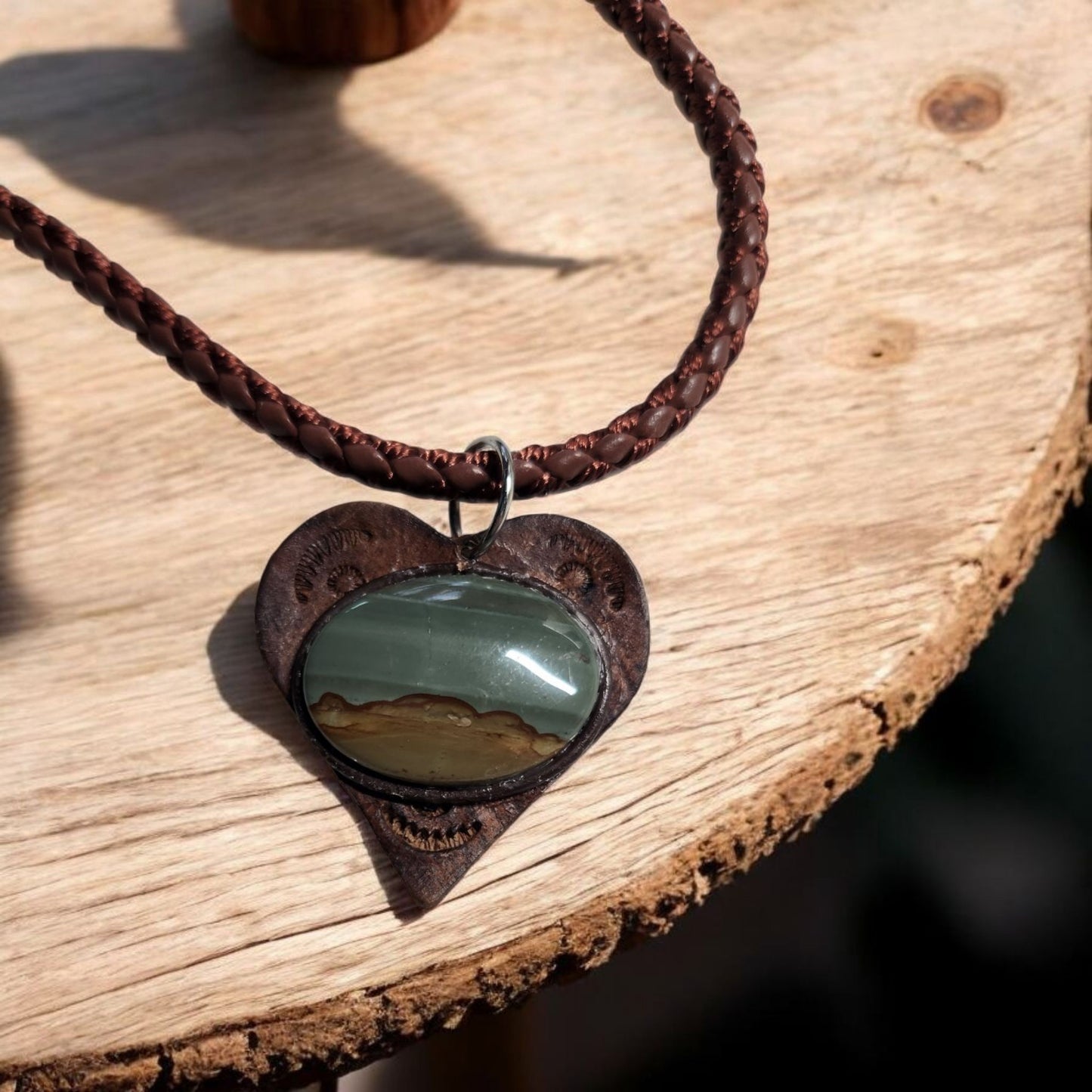 Beautiful tooled leather heart pendant with Unique Cabochon