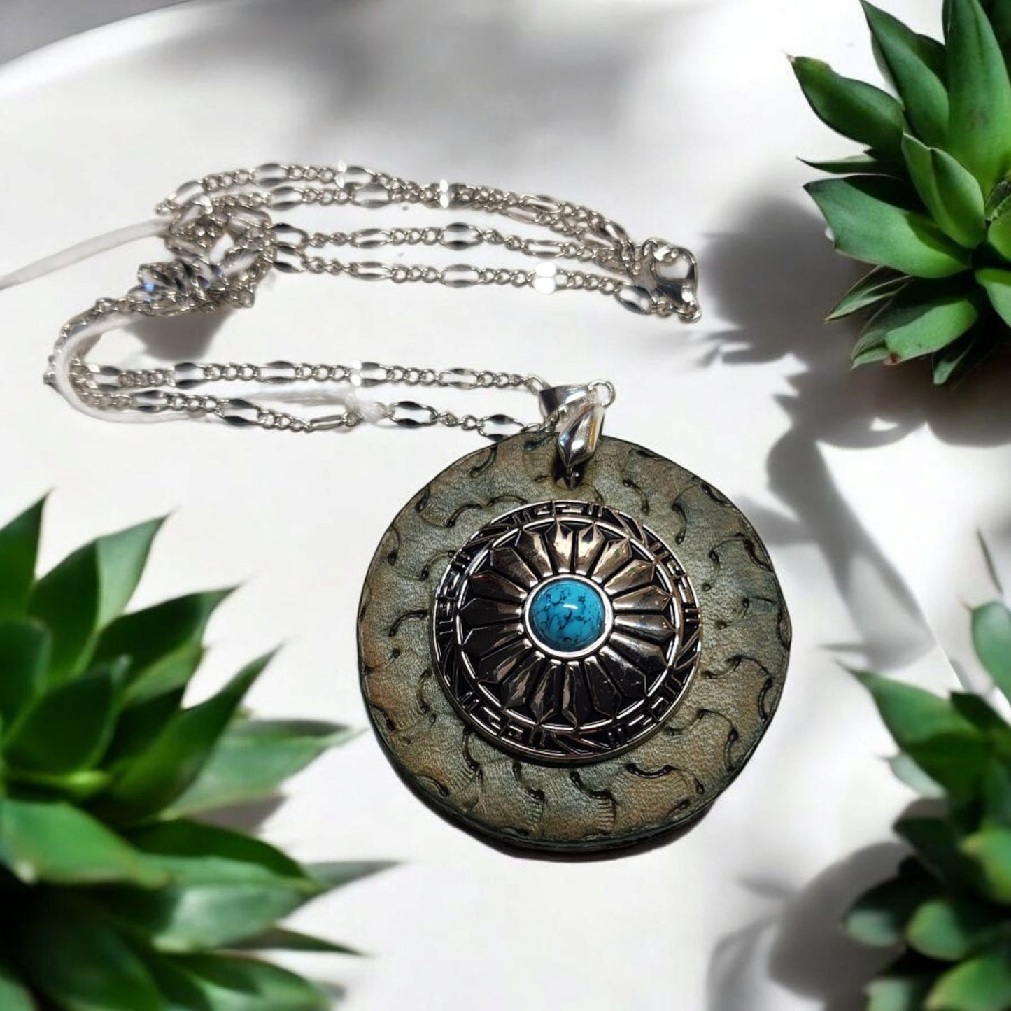 Green leather 2" pendant with silver and turquoise concho