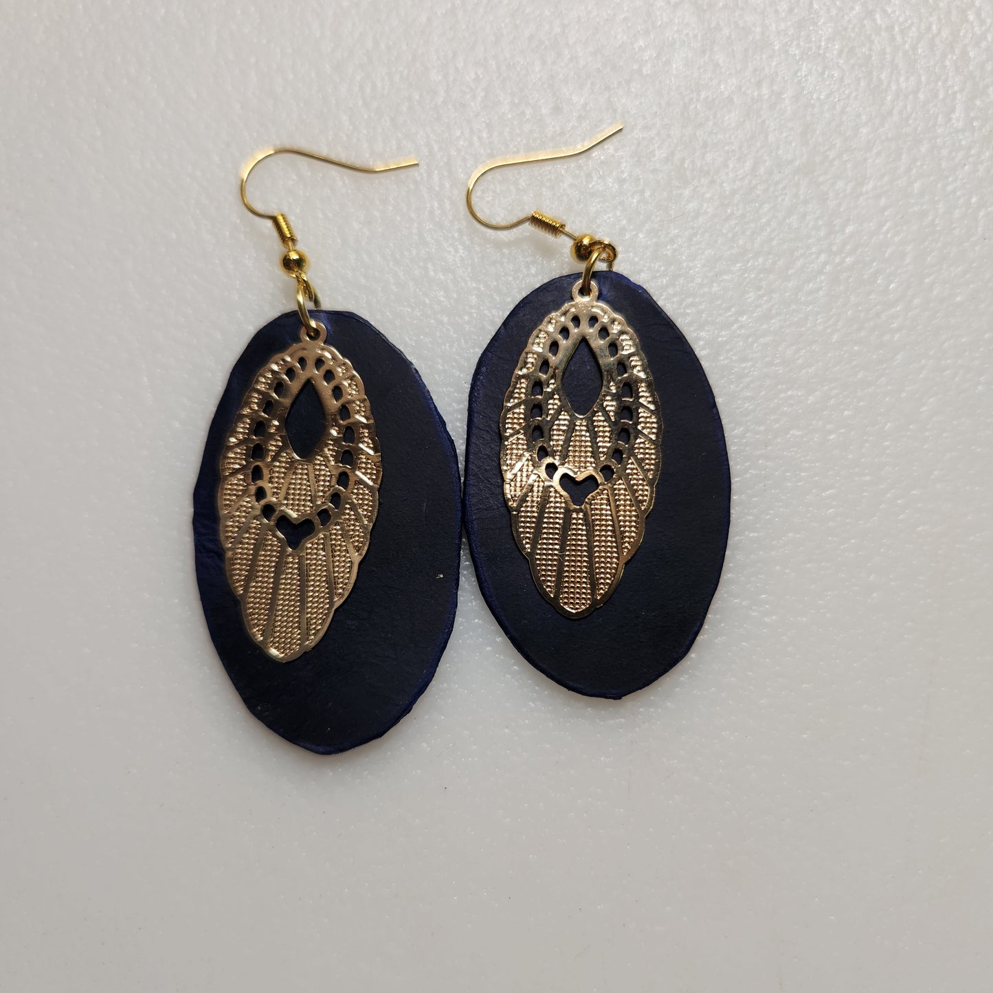 Deep Blue Leather Oval Earrings with Bright Gold Colored Bangles