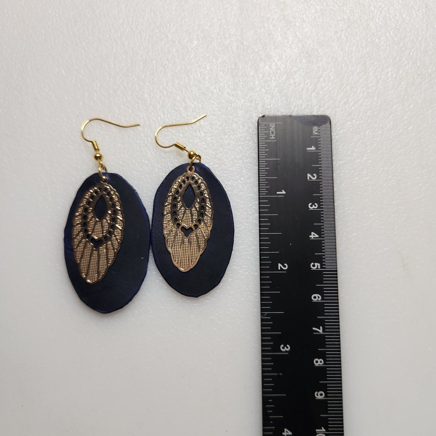 Deep Blue Leather Oval Earrings with Bright Gold Colored Bangles
