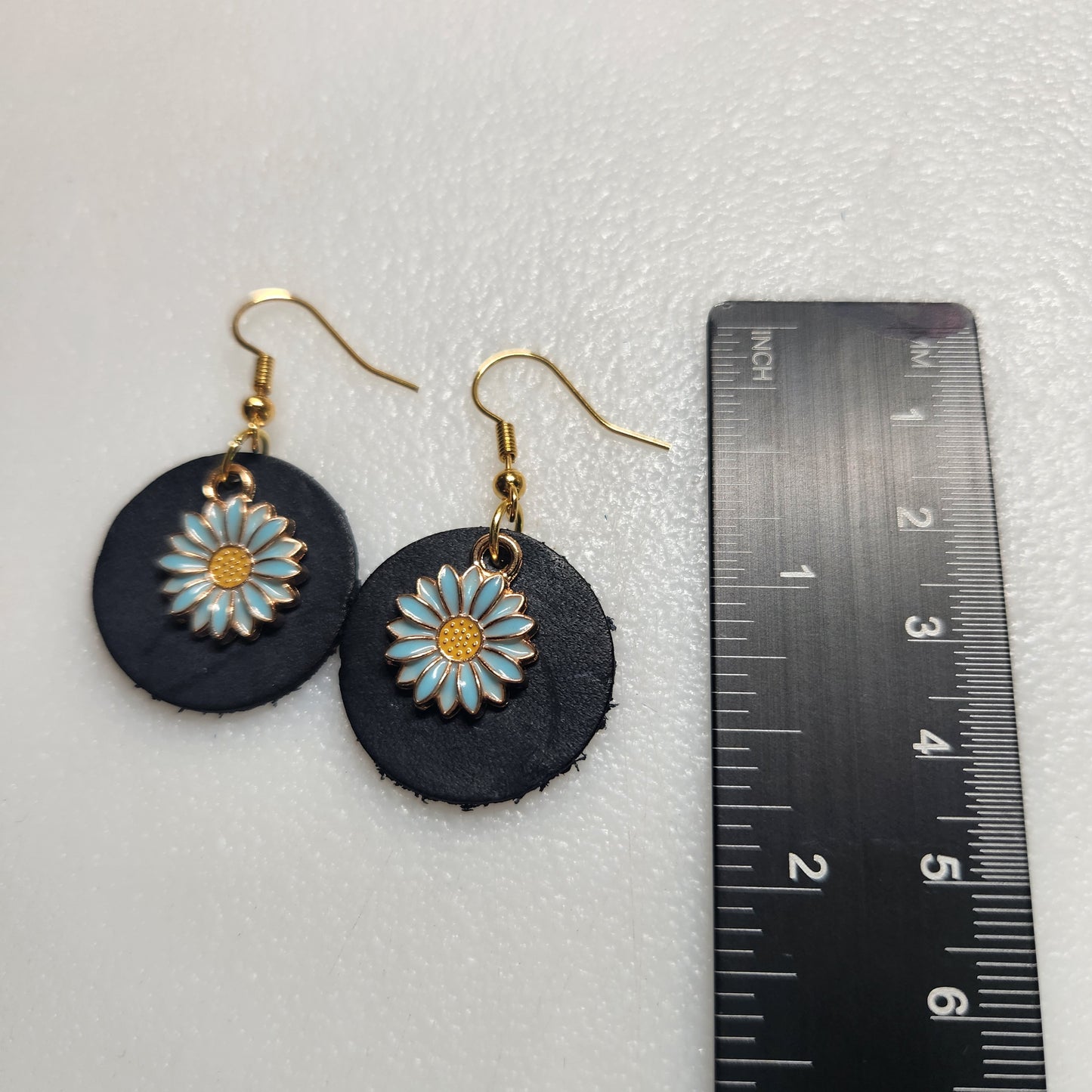 Classy Black Leather Earrings with Delicate Light Blue Flower Charm