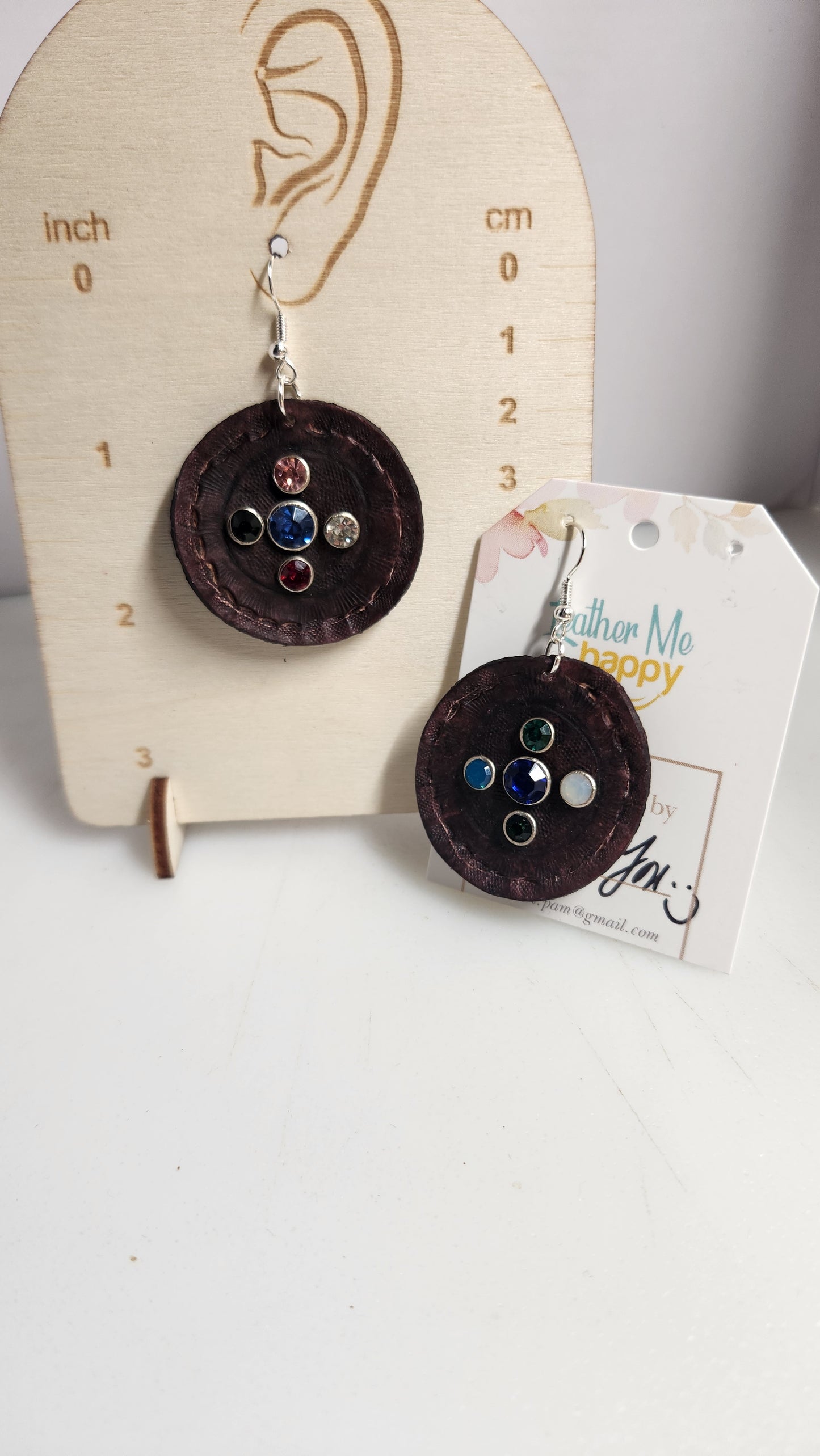 Beautiful tooled round earring with inset jewels