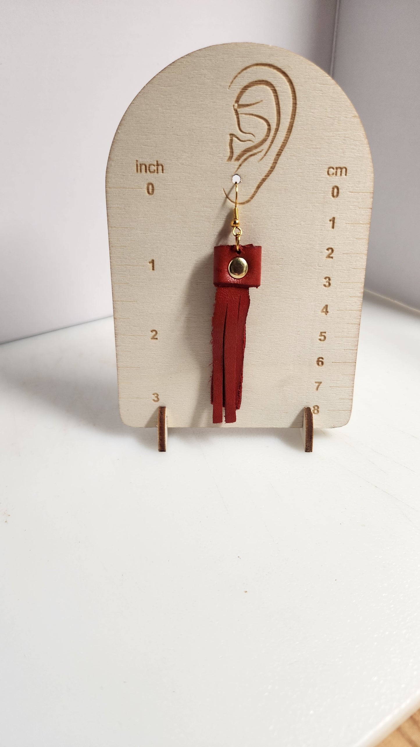 Classy red leather fringe earrings