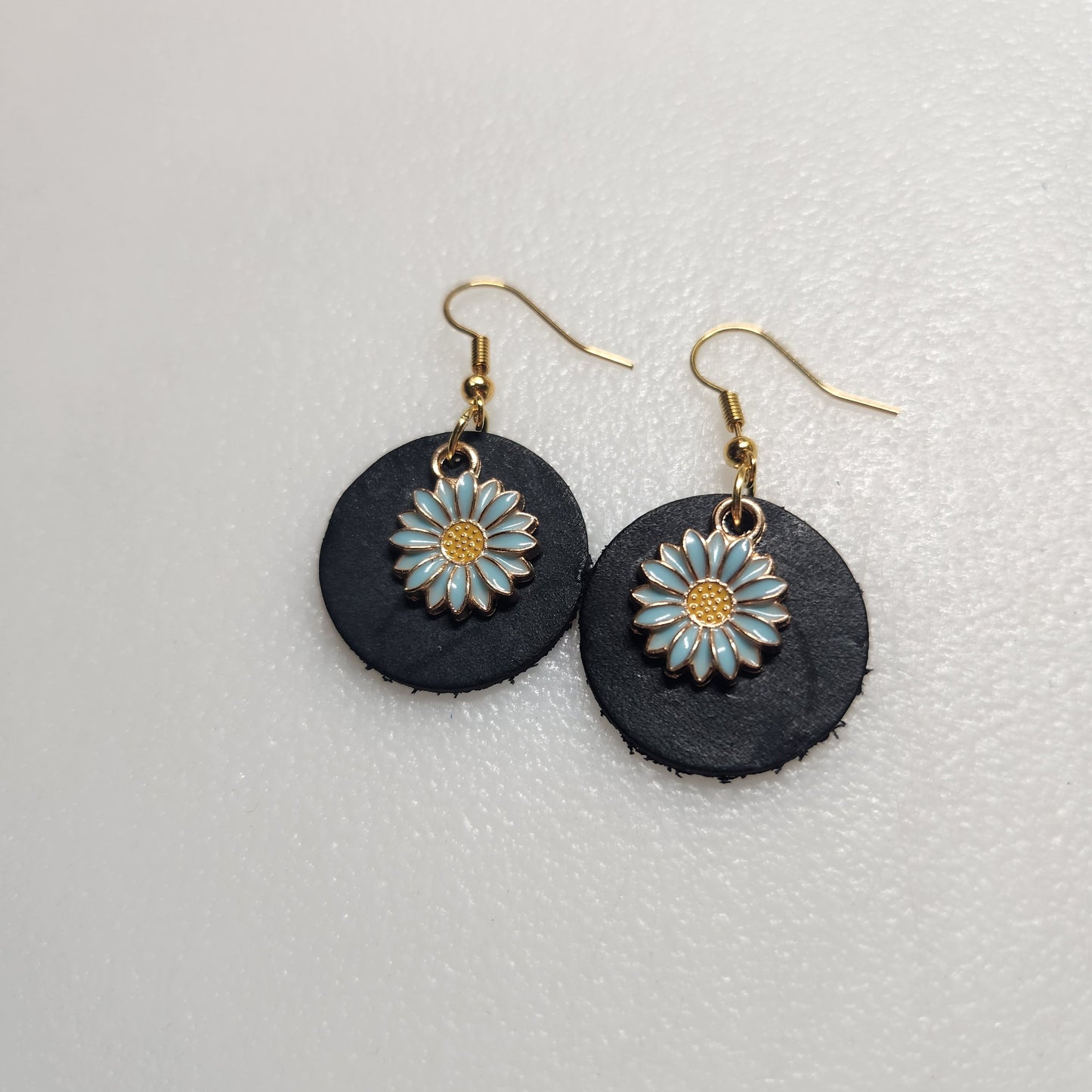 Classy Black Leather Earrings with Delicate Light Blue Flower Charm