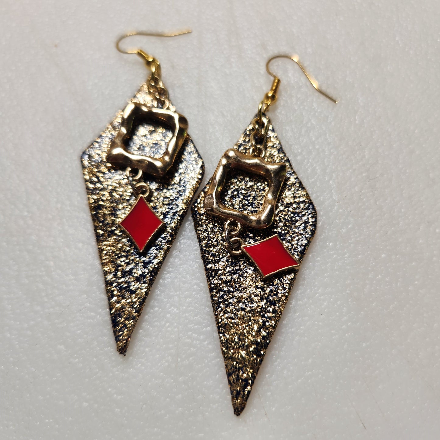Gold Glitter Leather Earrings with Red Color Splash and Gold Toned Bangle